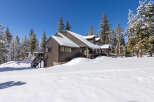 This stunning mountain home boasts a spacious layout, perfect for families or groups.