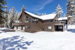 This stunning A-frame home boasts a spacious layout, with multiple levels offering breathtaking views.