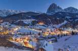 Nestled in a snow-covered valley, this charming village offers breathtaking views of the majestic mountains.
