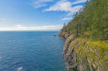 Spectacular oceanfront property boasting dramatic cliffs and lush evergreen forest.