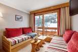 Cozy chalet apartment with stunning mountain views.