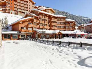 This stunning ski-in/ski-out chalet offers breathtaking mountain views and luxurious amenities.