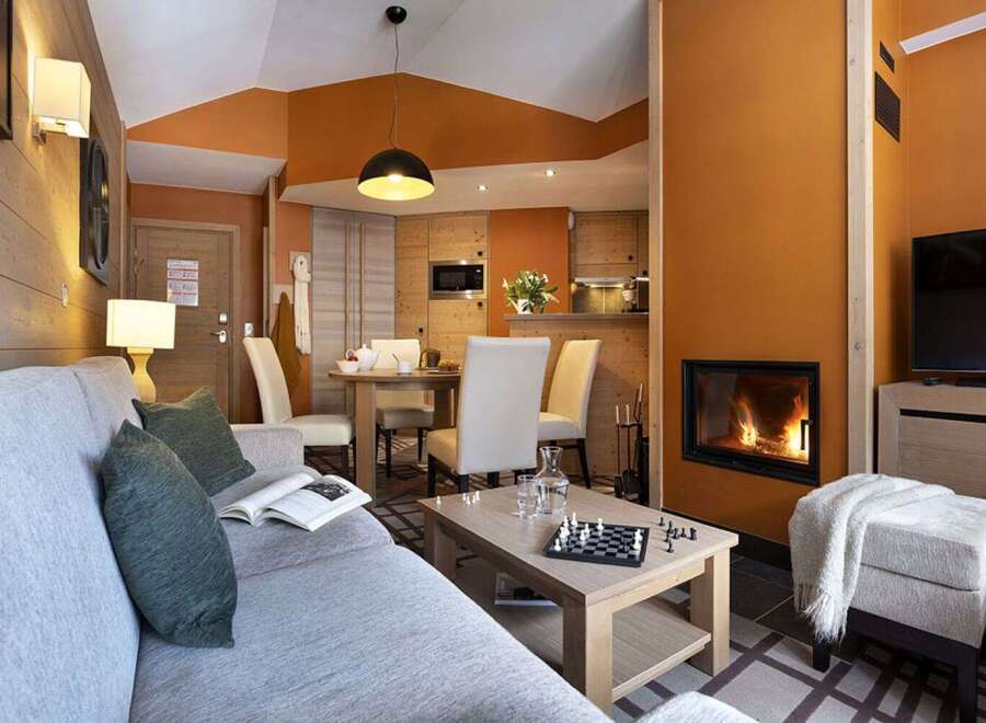 Cozy living room with a fireplace and comfortable seating.