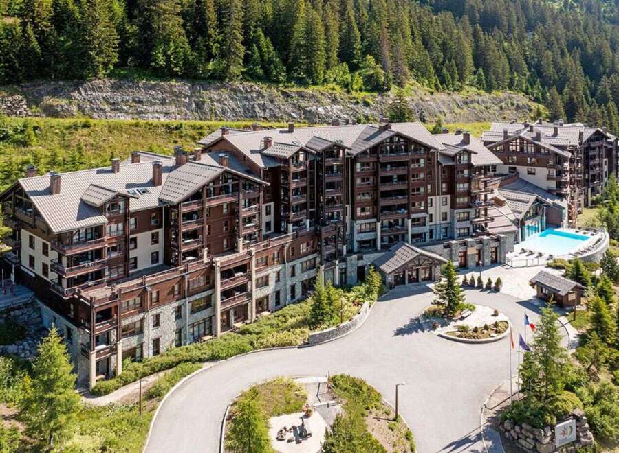 Nestled in the French Alps, this luxurious resort boasts stunning mountain views and spacious accommodations.