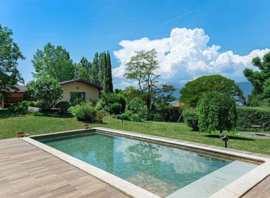 Luxury villa with private pool and stunning lake views.