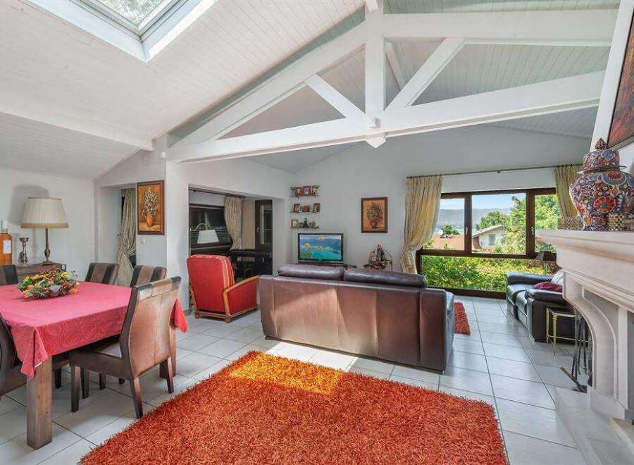 Stunning lake view from this bright and airy home.