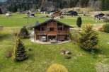 This stunning chalet boasts a prime location in the French Alps, offering breathtaking mountain views.