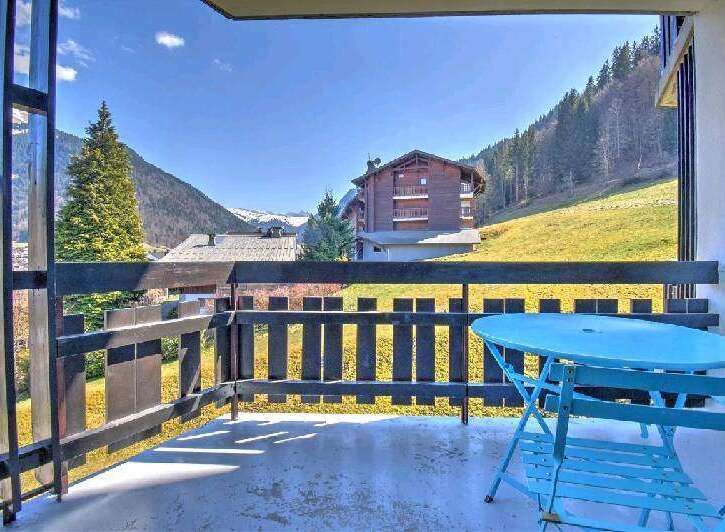 Enjoy breathtaking mountain views from your private balcony, complete with a charming bistro set for relaxing al fresco dining.