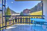 Enjoy breathtaking mountain views from your private balcony, complete with a charming bistro set for relaxing al fresco dining.