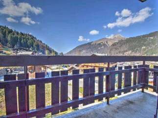 This stunning property boasts breathtaking mountain views from its private balcony.