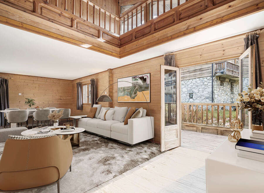 This stunning chalet boasts a spacious open-plan living area with high ceilings and large windows offering abundant natural light.
