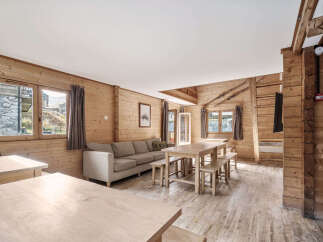 This stunning chalet boasts a spacious open-plan living area perfect for families and groups.