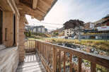 This charming wooden chalet boasts a private balcony offering breathtaking views of the Tignes ski resort.