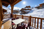Experience the ultimate winter getaway in this stunning chalet, offering breathtaking mountain views and a cozy atmosphere.