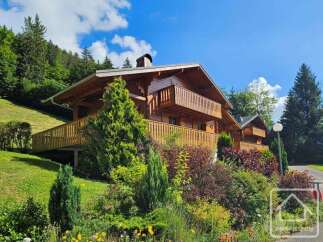 Nestled in a picturesque mountain setting, this charming chalet boasts stunning views and a tranquil atmosphere.