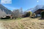 Discover a charming property nestled in a picturesque mountain setting.