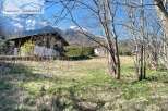 Discover a charming property nestled in a picturesque mountain setting.