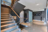 This stunning property boasts a modern, open-concept design with sleek lines and high-end finishes.