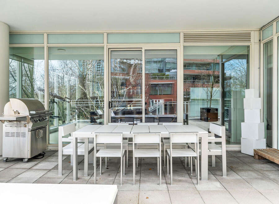 This luxurious condo boasts a spacious outdoor patio, perfect for entertaining.