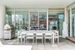 This luxurious condo boasts a spacious outdoor patio, perfect for entertaining.