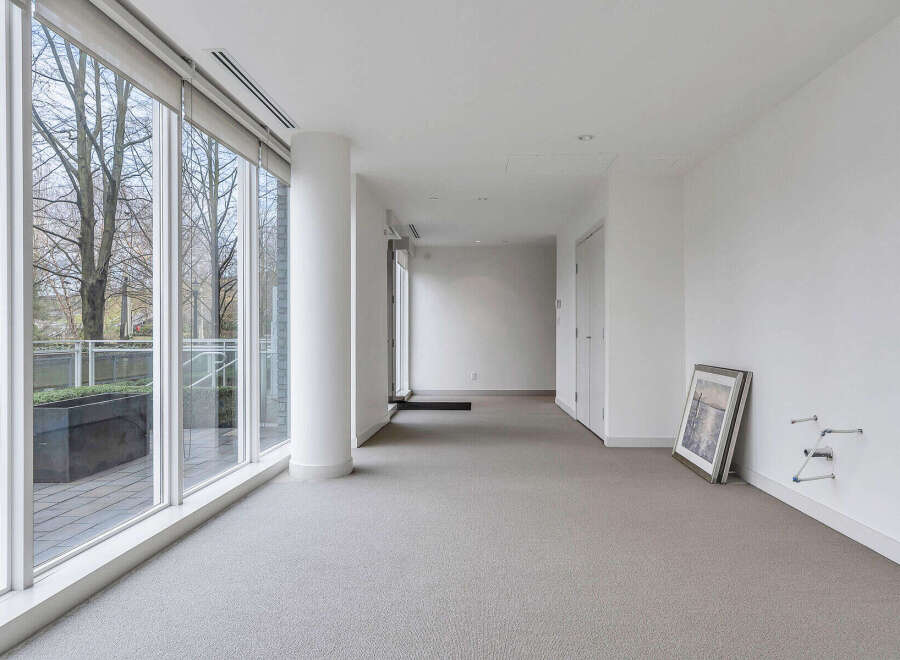 This stunning property boasts an open-concept design with floor-to-ceiling windows offering abundant natural light and breathtaking views.