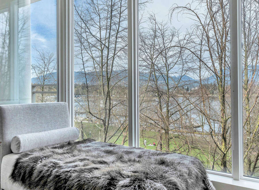 Luxurious condo boasting breathtaking views of the waterfront and mountains.