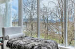 Luxurious condo boasting breathtaking views of the waterfront and mountains.