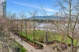 This stunning property boasts breathtaking views of the waterfront and mountains, with a beautifully landscaped park directly across the street.