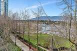 This stunning property boasts breathtaking views of the waterfront and mountains, offering a serene and picturesque setting.
