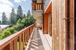 Enjoy the tranquility of this charming balcony, perfect for relaxing and soaking in the natural beauty.