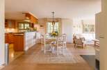 Step into a charming, light-filled home with a seamless blend of kitchen and living spaces.
