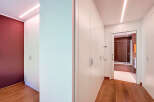 This stunning property boasts a spacious hallway with built-in wardrobes, offering ample storage space.