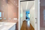 This stunning property boasts a modern bathroom with sleek, high-end finishes and fixtures.