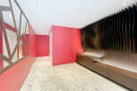 This stunning property boasts a modern and stylish hallway with unique design features.