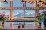 Luxury chalet kitchen with stunning mountain views.