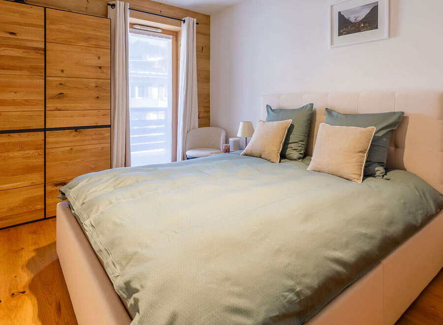 Discover a cozy bedroom retreat with a touch of rustic charm.