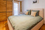 Discover a cozy bedroom retreat with a touch of rustic charm.
