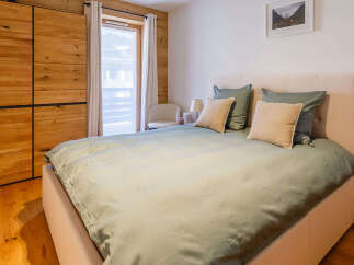 Discover a cozy bedroom retreat with a touch of rustic charm.