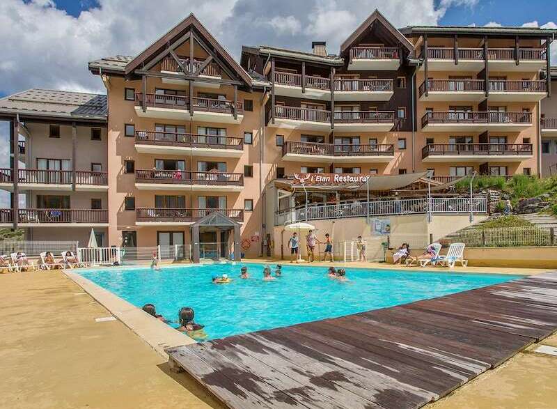This stunning resort boasts a sparkling outdoor pool, perfect for a refreshing dip after a day of adventure.
