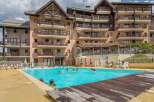 This stunning resort boasts a sparkling outdoor pool, perfect for a refreshing dip after a day of adventure.