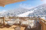 Cozy up on your private balcony with breathtaking mountain views.