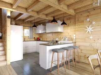 Cozy chalet kitchen with wooden beams, white cabinets, and a breakfast bar.