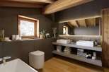 This stunning bathroom boasts a luxurious design with a spacious layout.