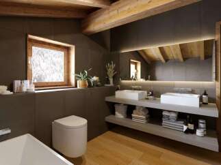 This stunning bathroom boasts a luxurious design with a spacious layout.