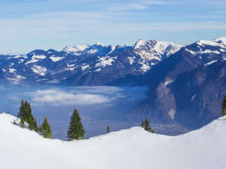 Breathtaking panoramic view of snow-capped mountains and valleys.