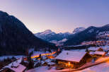Nestled in a picturesque alpine village, this charming chalet offers breathtaking mountain views and cozy interiors.