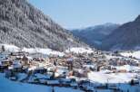 Nestled in a picturesque snowy valley, this charming village offers breathtaking mountain views and a peaceful atmosphere.