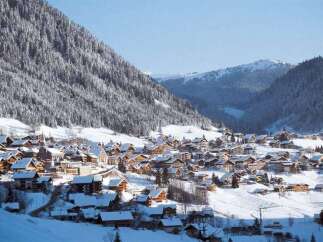 Nestled in a picturesque snowy valley, this charming village offers breathtaking mountain views and a peaceful atmosphere.