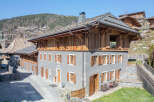 Discover the charm of this stunning property, boasting a unique architectural design with a blend of wood and stone.