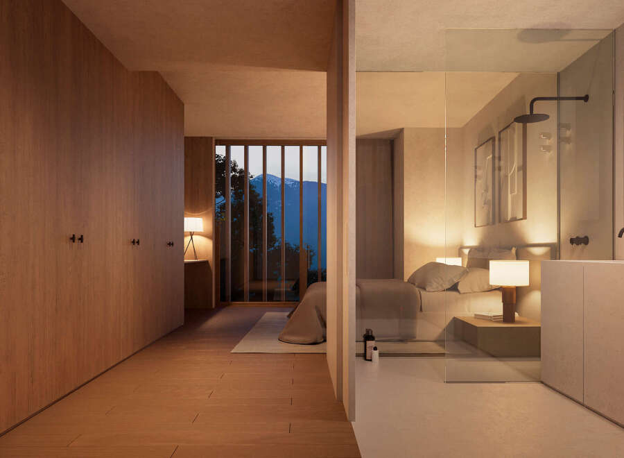 Luxurious bedroom with ensuite bathroom and mountain views.